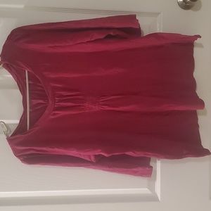 Women's quarter-sleeve shirt.